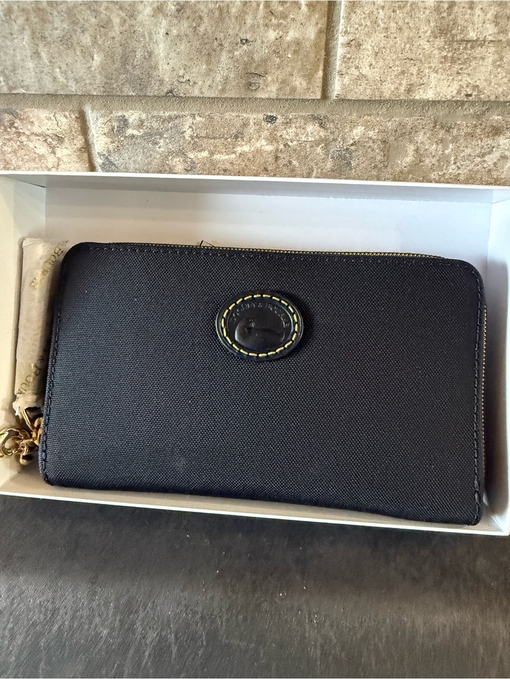 Dooney & Bourke Black Zip-Around Continental Wallet with Logo Patch